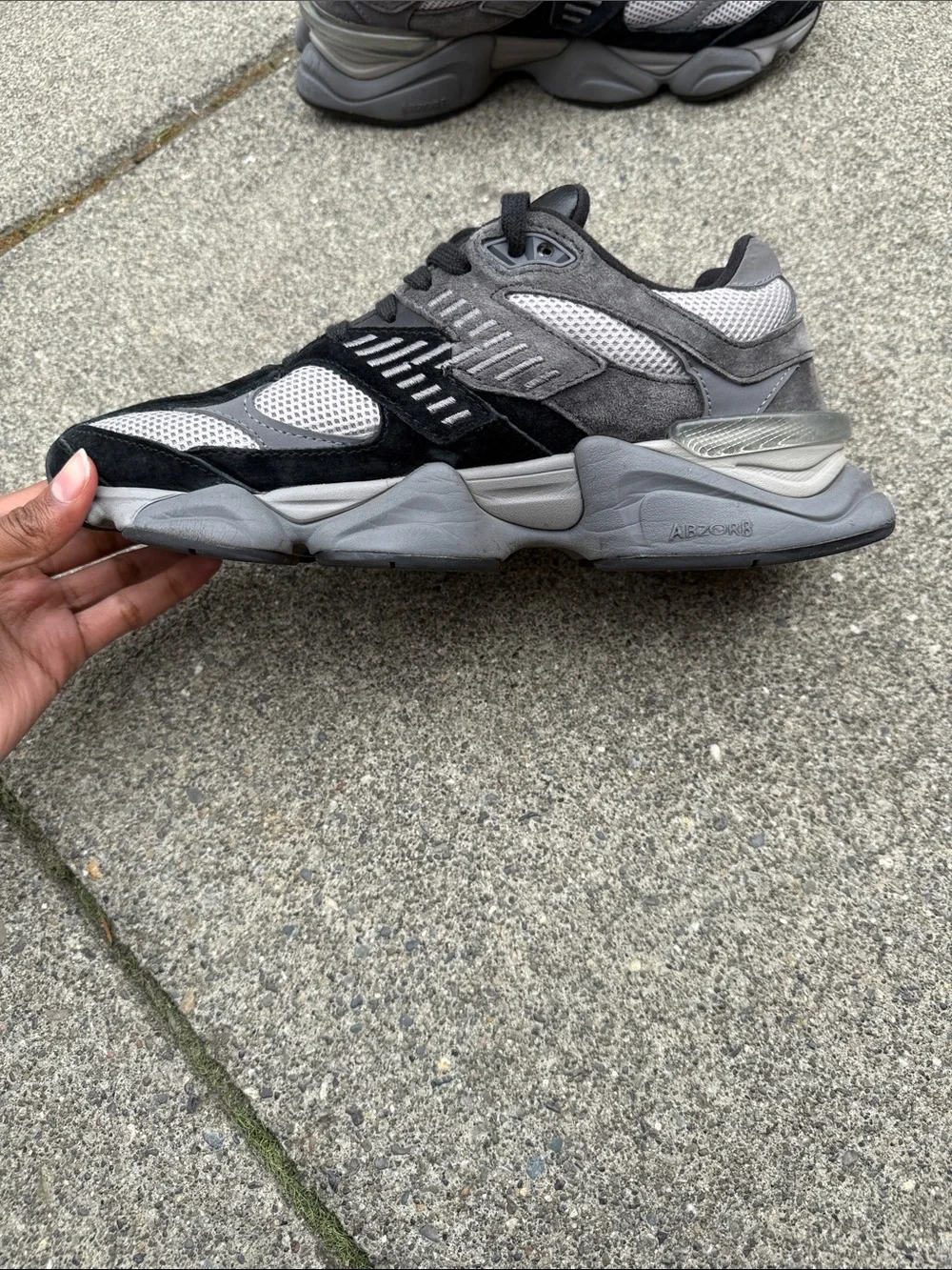 New Balance Black and Gray Men's Athletic Sneakers with Red Tongue Accents